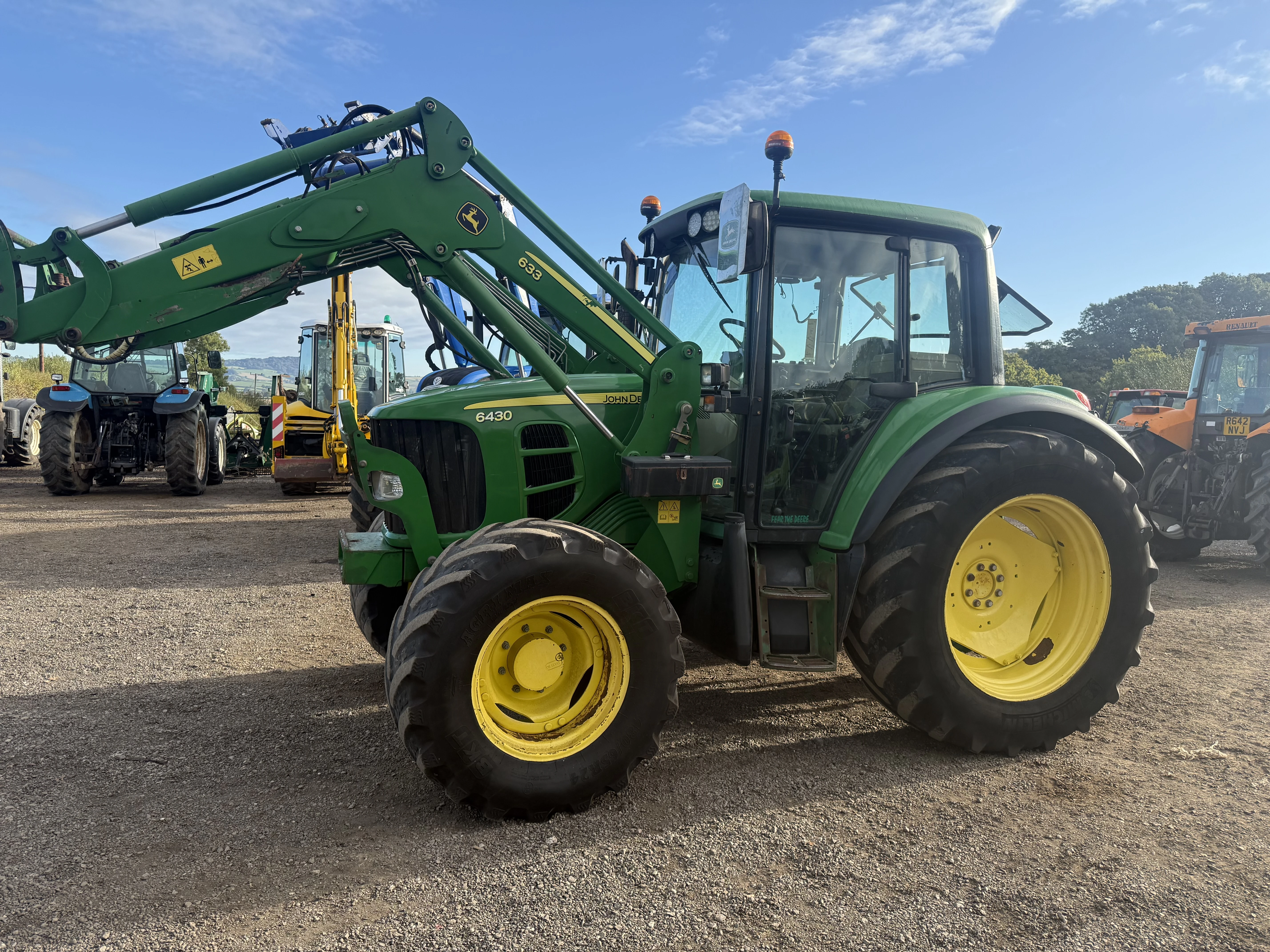 John Deere 6430 4x4 loader tractor